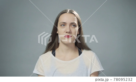 Photo of young woman with denial on grey 78095232