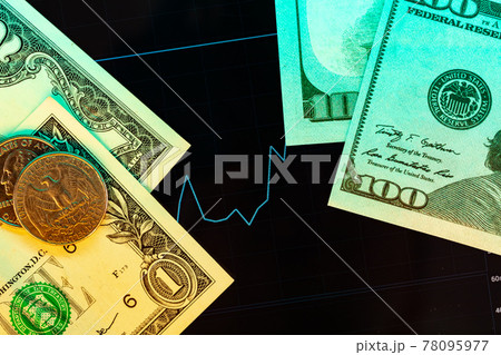 American dollar banknotes and graph on black background American dollar banknotes and graph on black background 78095977