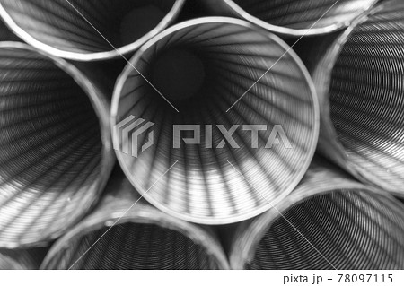 Abstract background of steel pipes. Construction equipment.	 78097115