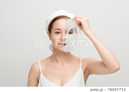 Bubbling mask on the face of beautiful woman. Skin care mask. 78097753