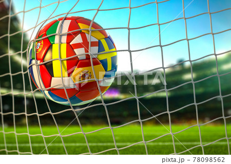 Soccer football ball with flags of european countries in the net of goal on football stadium. Euro championship 2021. 78098562