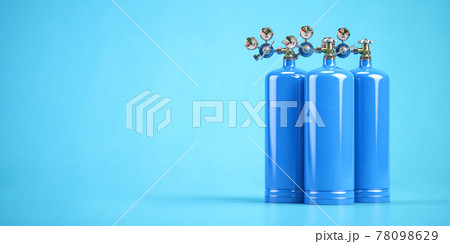 Blue oxygen tanks or cylinders on blue background. 78098629