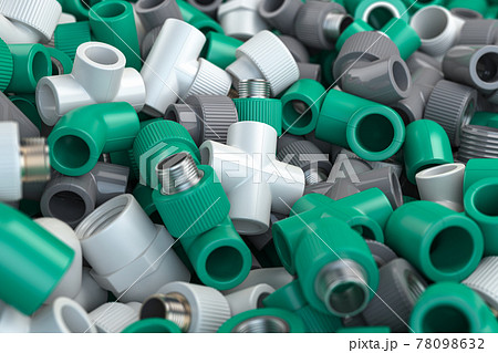 Various fittings of pvc plastic pipes and tubes in heap. Plumbing ackground. 78098632