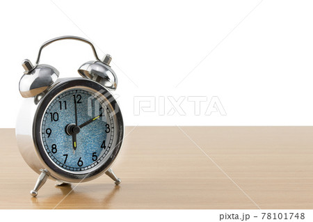 alarm clock on the table on white background. 78101748