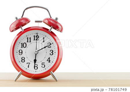 alarm clock on the table on white background. alarm clock on the table on white background. 78101749
