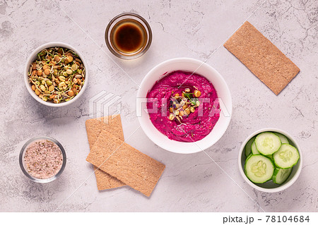 Roasted Beet Hummus in a bowl. Roasted Beet Hummus in a bowl. 78104684