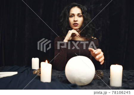 Portrait of fortune-teller in a dark room Portrait of fortune-teller in a dark room 78106245