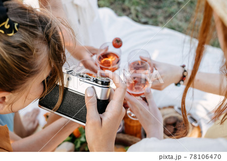 Social Media Content Ideas, Content creator for brands, food blog, summer picnic. Young woman food blogger, content creator with professional camera taking food photo of croissant in picnic on nature Social Media Content Ideas, Content creator for brands, food blog, summer picnic. Young woman food blogger, content creator with professional camera taking food photo of croissant in picnic on nature 78106470