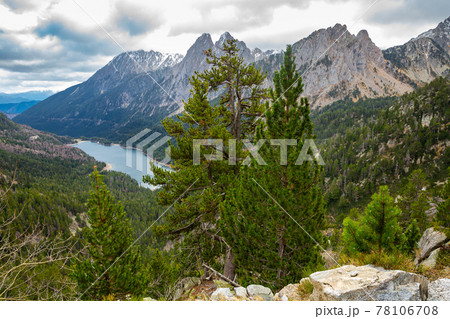 Top view of Els Encantats flowed in canyon in Estany de Sant Maurici in Espot in Spain Top view of Els Encantats flowed in canyon in Estany de Sant Maurici in Espot in Spain 78106708