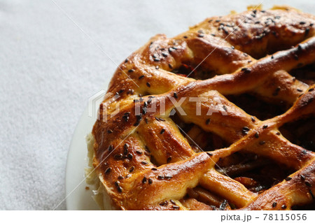 Freshly baked homemade cake on a towel at a 45 degree angle Freshly baked homemade cake on a towel at a 45 degree angle 78115056