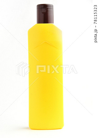 Yellow bottle on white background 78115323