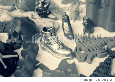 Models printed by 3d printer. Bright colorful objects printed on a 3d printer Models printed by 3d printer. Bright colorful objects printed on a 3d printer 78120318
