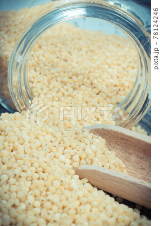 Fresh healthy millet groats as source vitamins and minerals. Nutritious eating 78124246