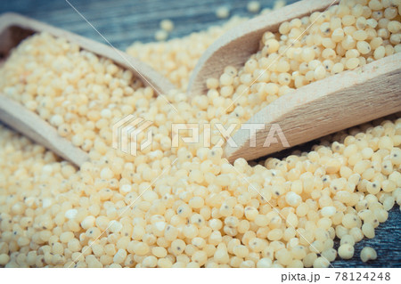 Fresh healthy millet groats as source vitamins and minerals. Nutritious eating 78124248