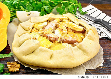 Galeta with pumpkin and pear on dark board 78124403