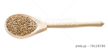 barnyard millet seeds in wooden spoon isolated 78128780