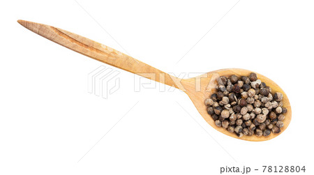 top view of monk's pepper (vitex) in wood spoon 78128804