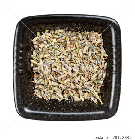 old dried lavender in black bowl isolated 78128836