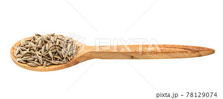 wooden spoon with cumin seeds isolated wooden spoon with cumin seeds isolated 78129074