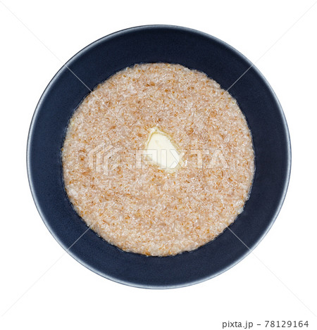 top view of buttered porridge from wheat groats top view of buttered porridge from wheat groats 78129164