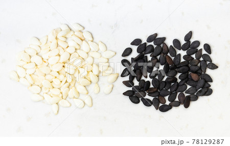 top view of black and white sesame seeds 78129287