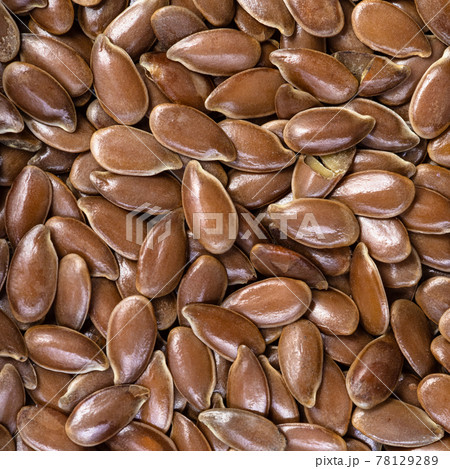 brown flax seeds close up 78129289