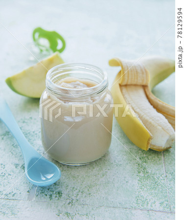 Jar of banana puree, apples and banana Jar of banana puree, apples and banana 78129594
