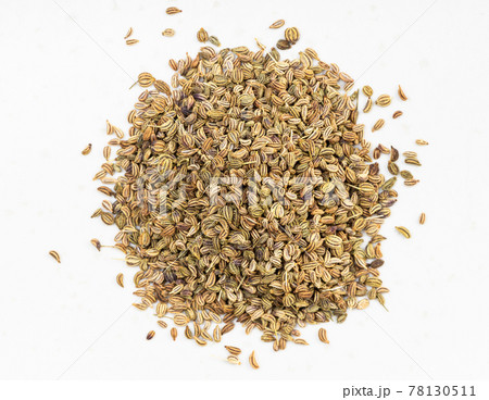top view of pile of Ajwain seeds close up on gray 78130511