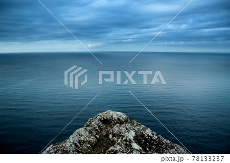 Edge of Cliff on Japanese Coastline Overlooking Bay 78133237