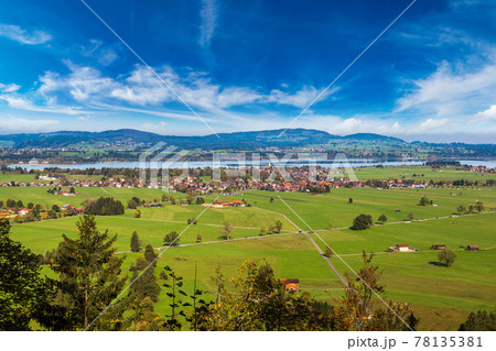 Green fields next to Neuschwanstein Green fields next to Neuschwanstein 78135381