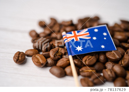 Australia flag on coffee beans; import export drink food concept. Australia flag on coffee beans; import export drink food concept. 78137629