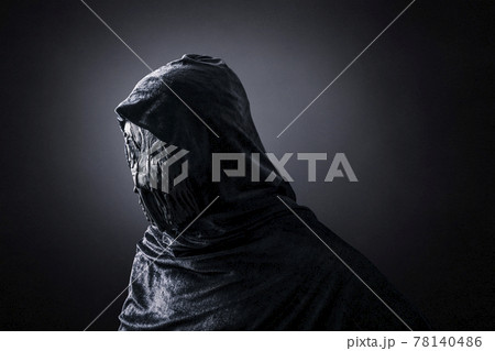 Creepy figure in the dark 78140486