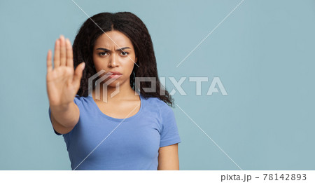 No discrimination. African american woman showing stop gesture to camera over blue background, panorama 78142893