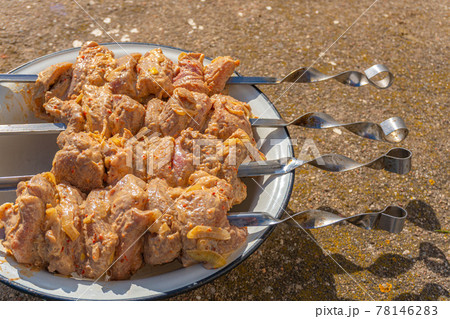 Marinated meat on skewers for cooking on the grill 78146283