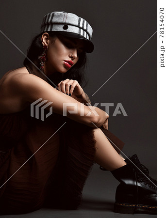 Portrait of young brunette woman with tattoo and Portrait of young brunette woman with tattoo and 78154070
