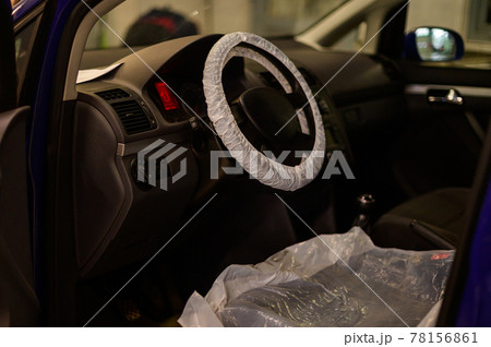 Computer diagnostics of the onboard computer in the car in a car dealership. 78156861