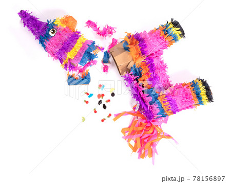 Broken colorful donkey pinata isolated on white 78156897