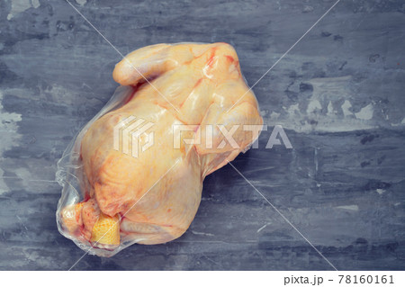 chicken in vacuum bag on ceramic background chicken in vacuum bag on ceramic background 78160161