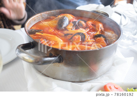 portuguese fish stew in iron pot portuguese fish stew in iron pot 78160192
