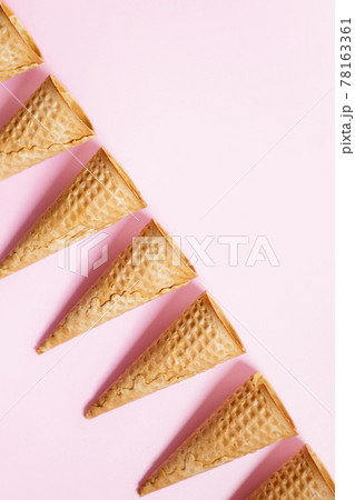 Ice cream cones on pink color background. 78163361