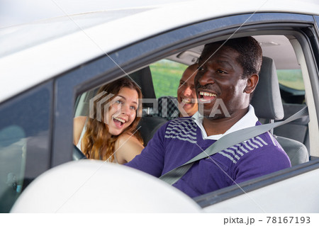 Friend talking in car during common trip 78167193