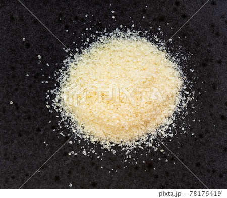 pile of crystalline beef gelatine closeup on black pile of crystalline beef gelatine closeup on black 78176419