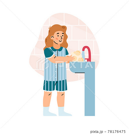 Cute young child girl washing hands with water and soap in sink at bathroom. 78176475
