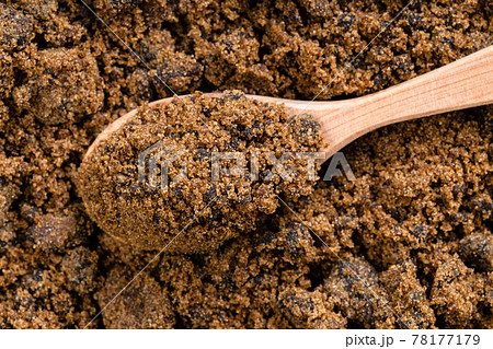top view of spoon with dark muscovado cane sugar top view of spoon with dark muscovado cane sugar 78177179