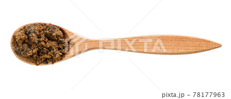 top view of muscovado cane sugar in spoon isolated top view of muscovado cane sugar in spoon isolated 78177963