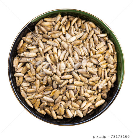 whole milk thistle seeds in round bowl isolated 78178166