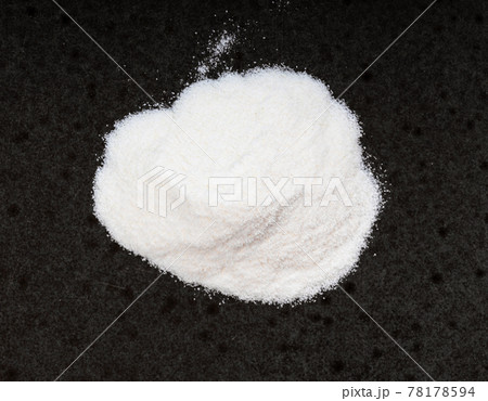 top view of pile of agar powder close up on black 78178594