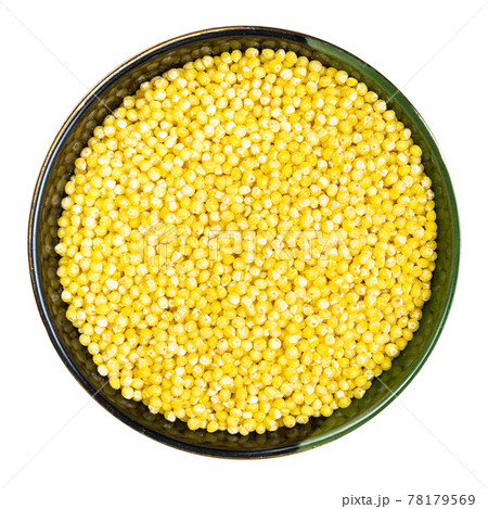 polished proso millet in round bowl isolated 78179569