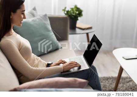 Relax on comfortable couch at home, chat in social network, spending lazy weekend Relax on comfortable couch at home, chat in social network, spending lazy weekend 78180041