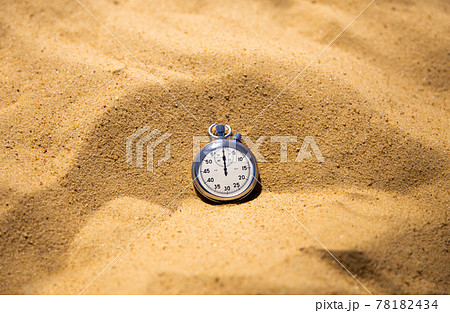 Stopwatch lying on the sand, beach volleyball competitions. Timeout and running time 78182434
